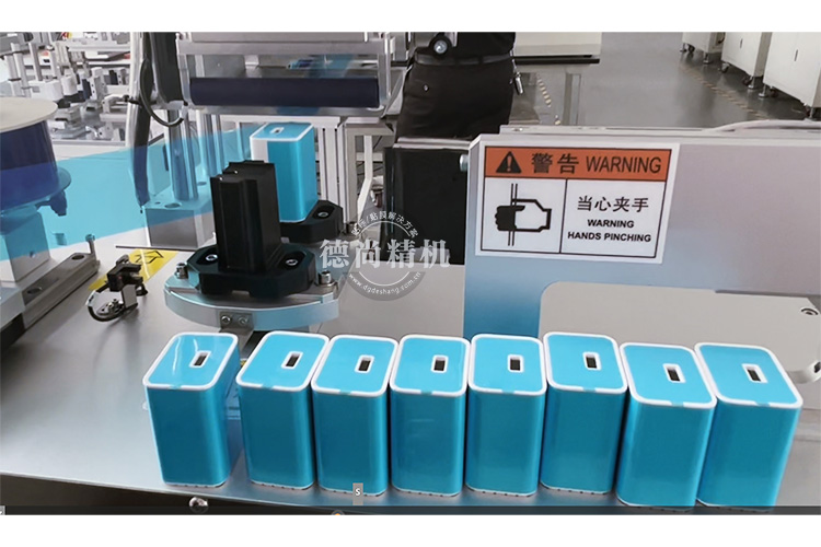 德尚雙工位手機(jī)充電器貼膜機(jī)，降本增效利器！